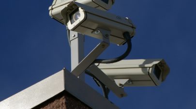 three surveillance cameras
