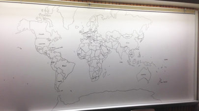 11 year old buy with autism world map drawn by hand 1