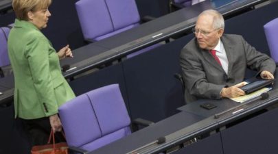 german chancellor merkel and finance minister schaeuble arrive for a debate at t