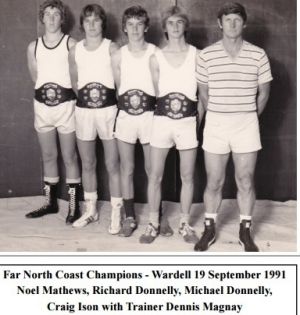 Craig Ison, second from right, as a boxing champion in 1991.