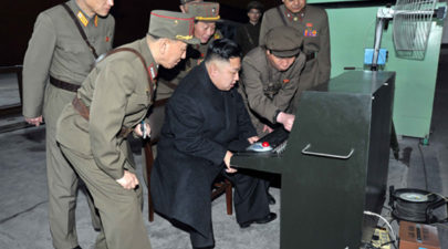 kju looking at the red button machine1