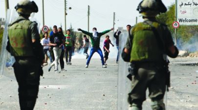palestinian killed in rioting near chevron