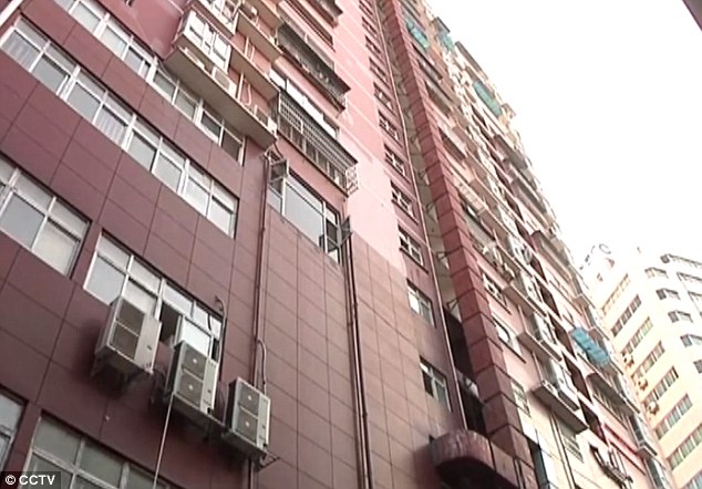 Unknown: It is not clear how the woman came to fall from the 11th floor window of the building pictured