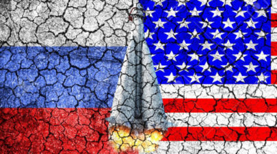 58139952 flag of russia and usa painted on the cracked wall concept of war cold war the arms race nuclear war