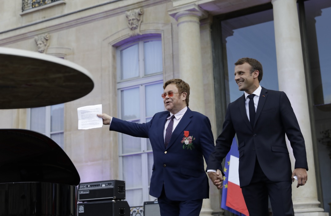AP Emmanuel Macron Elton John