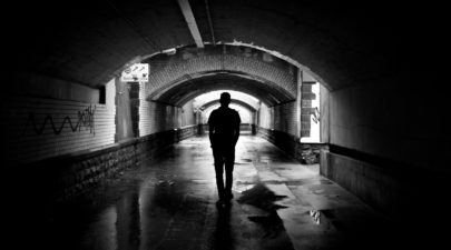 silhouette photo of a man in a tunnel 169978