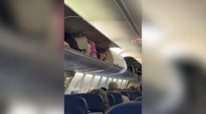 Southwest passengers baffled after woman climbs into overhead bin for nap 0 42 screenshot