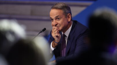 7077084